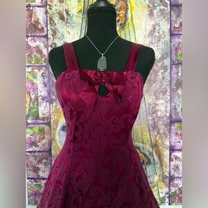 Chic Strapless Burgundy Dress with Bow Accent